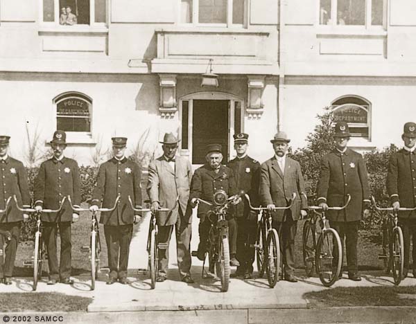 Photographic print of members of the Sacramento Police Department posing with bicycles